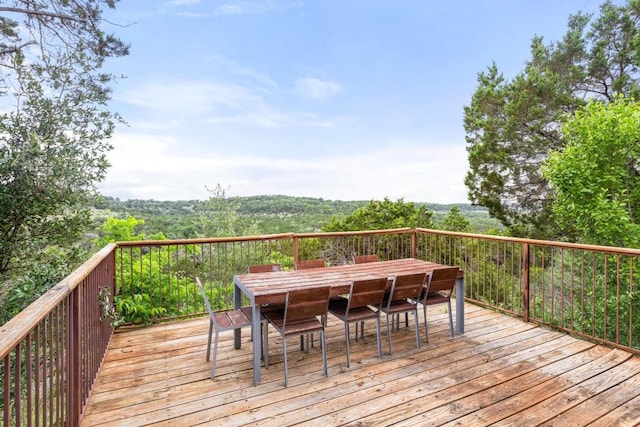 8100 Kuhn Dr, Austin, TX 78736 - deck with outdoor dining area and a forest view