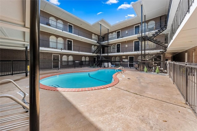 101 E 33rd St Unit 104, Austin, TX 78705 - community pool with fence and a patio area