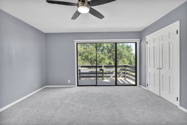 721 Fawn, Horseshoe Bay, TX 78657 - unfurnished bedroom featuring carpet, a ceiling fan, and a closet