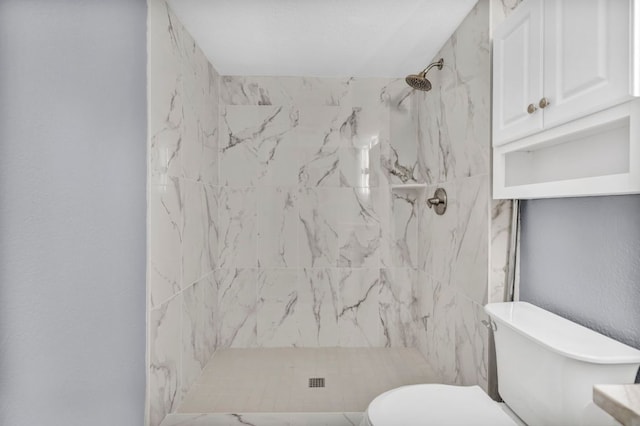 721 Fawn, Horseshoe Bay, TX 78657 - bathroom with a marble finish shower and toilet