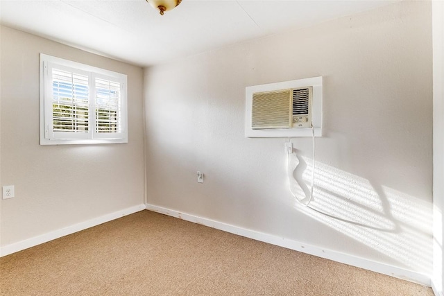 950 County Road 221, Tow, TX 78672 - spare room featuring carpet flooring, baseboards, and a wall unit AC
