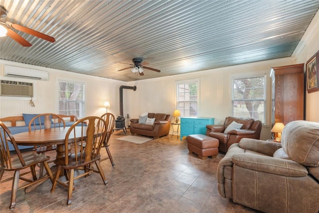 tiled dining area featuring crown molding, a ceiling fan, a wall mounted air conditioner, and wooden ceiling