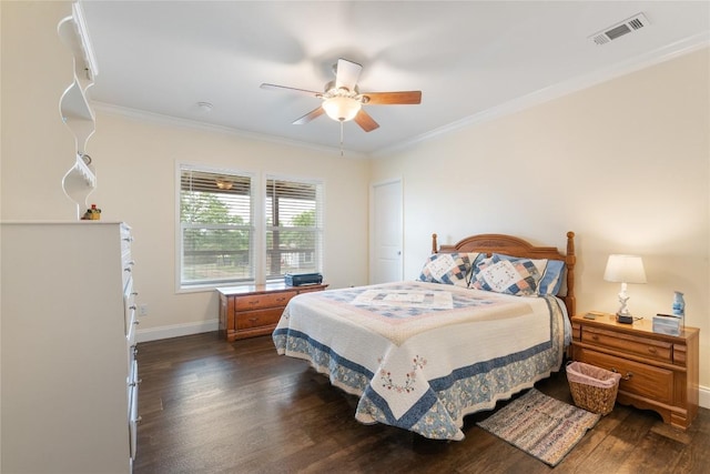 bedroom with baseboards, visible vents, ornamental molding, and dark wood-type flooring