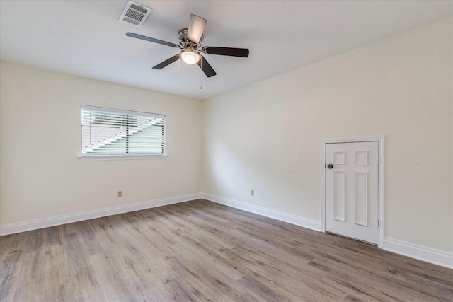 13109 Marble Falls Cv, Austin, TX 78729 - spare room with wood finished floors and ceiling fan