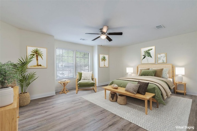 13109 Marble Falls Cv, Austin, TX 78729 - bedroom featuring wood finished floors and ceiling fan