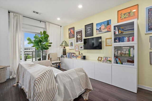 bedroom featuring visible vents, recessed lighting, and wood finished floors