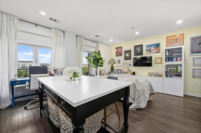 dining area with recessed lighting, visible vents, and dark wood finished floors