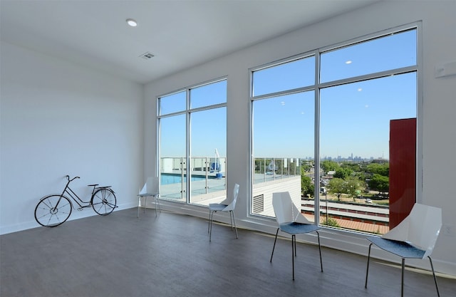 4361 S Congress Ave Unit 427, Austin, TX 78745 - unfurnished room with wood finished floors, plenty of natural light, and baseboards