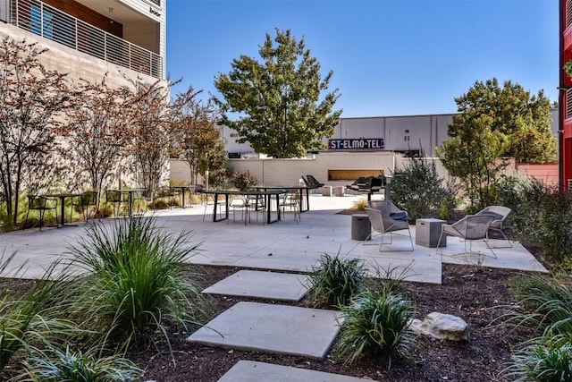 view of home's community featuring a patio