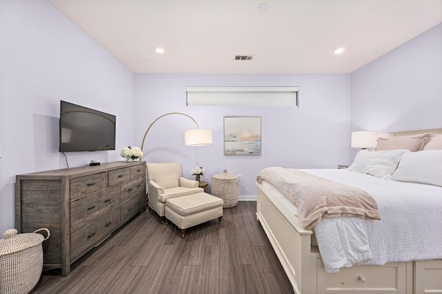 bedroom with visible vents, recessed lighting, dark wood finished floors, and baseboards