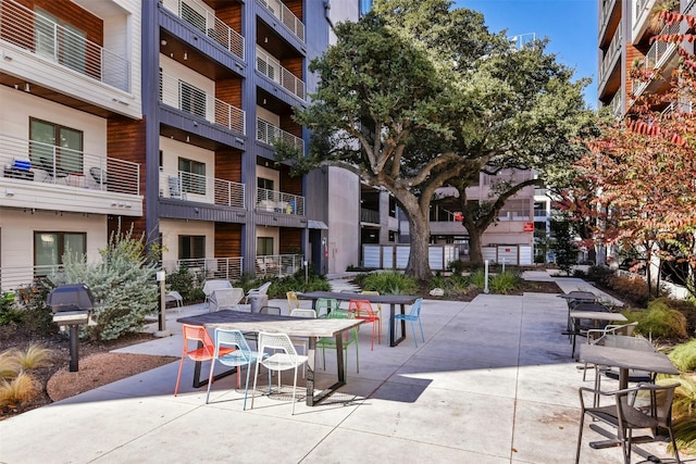 view of home's community featuring a patio area
