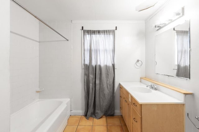 full bath with tile patterned flooring, shower / tub combination, baseboards, vanity, and ornamental molding