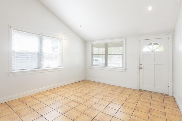 entryway with recessed lighting, baseboards, and vaulted ceiling