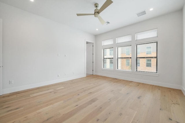 unfurnished room featuring recessed lighting, baseboards, ceiling fan, and light wood finished floors