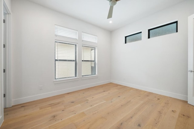 unfurnished room with baseboards, a ceiling fan, recessed lighting, and light wood-style flooring