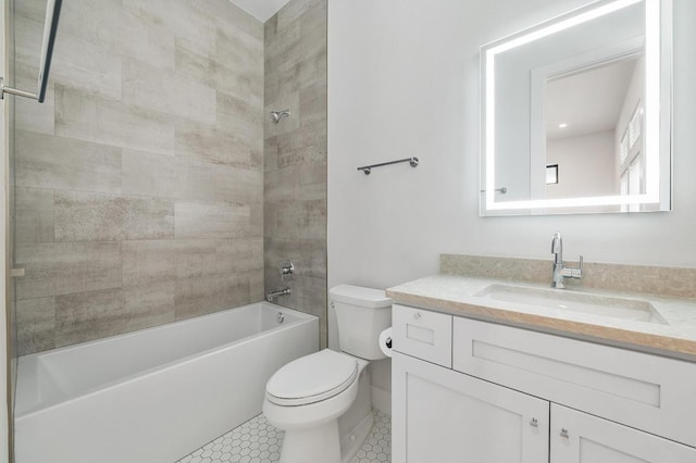 bathroom with tile patterned floors, vanity, toilet, and bathing tub / shower combination