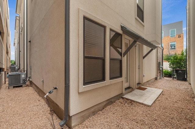 view of home's exterior with central AC