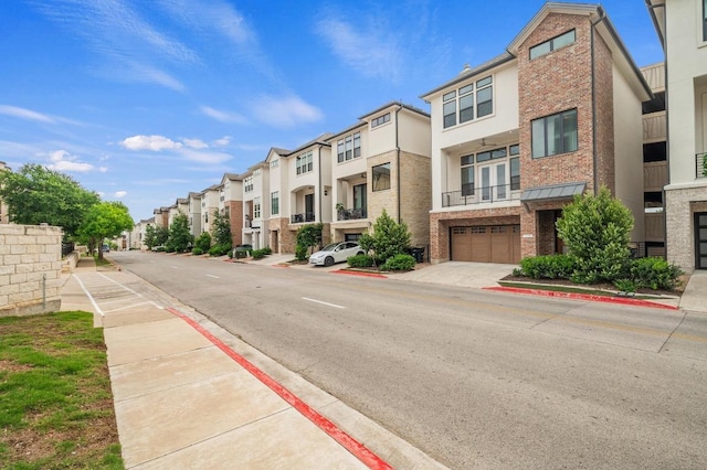 view of street featuring a residential view, sidewalks, and curbs