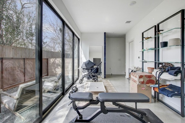exercise room featuring visible vents