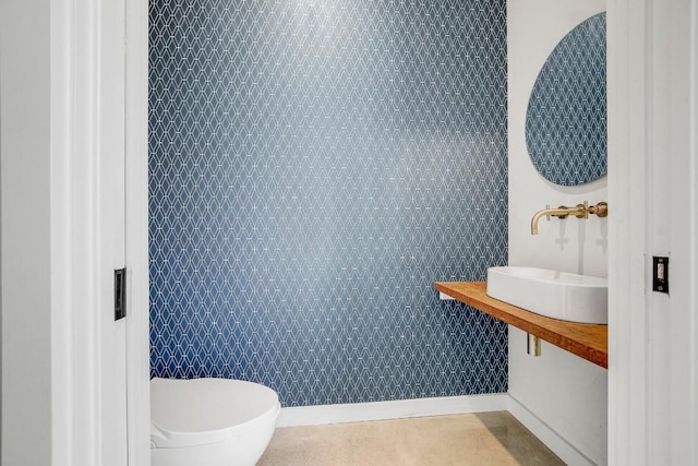 bathroom with a sink and toilet