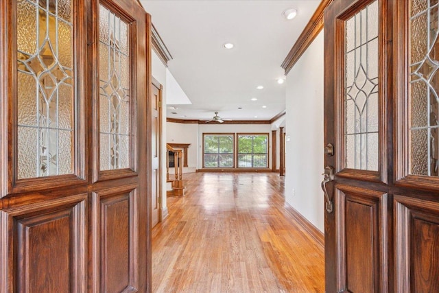 640 Woodlake Dr, Mcqueeney, TX 78123 - foyer featuring light wood-style flooring, recessed lighting, baseboards, a ceiling fan, and ornamental molding