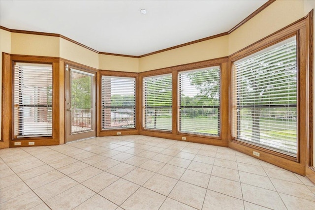 640 Woodlake Dr, Mcqueeney, TX 78123 - unfurnished room with light tile patterned floors, ornamental molding, and a wealth of natural light