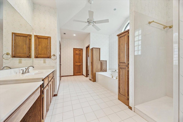 640 Woodlake Dr, Mcqueeney, TX 78123 - bathroom with wallpapered walls, vanity, a garden tub, a ceiling fan, and lofted ceiling