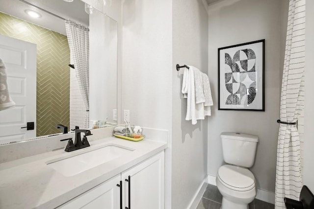 full bathroom featuring baseboards, tile patterned flooring, toilet, and vanity