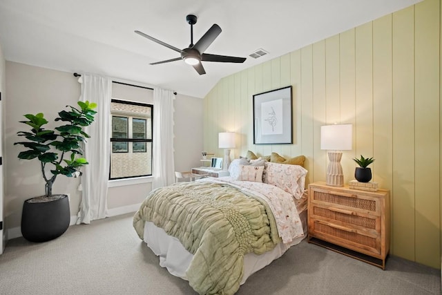 carpeted bedroom with ceiling fan and visible vents