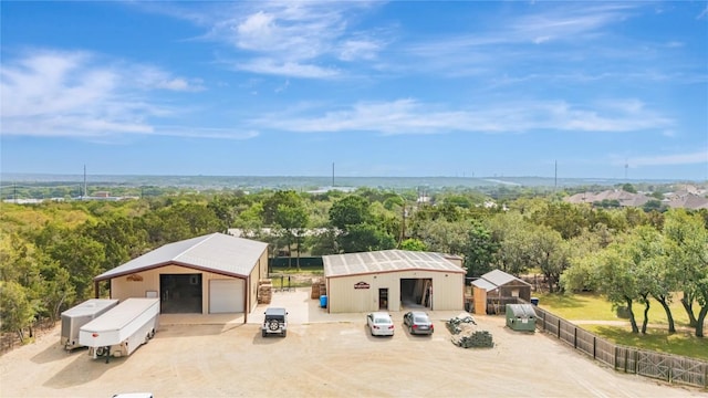exterior space featuring a wooded view