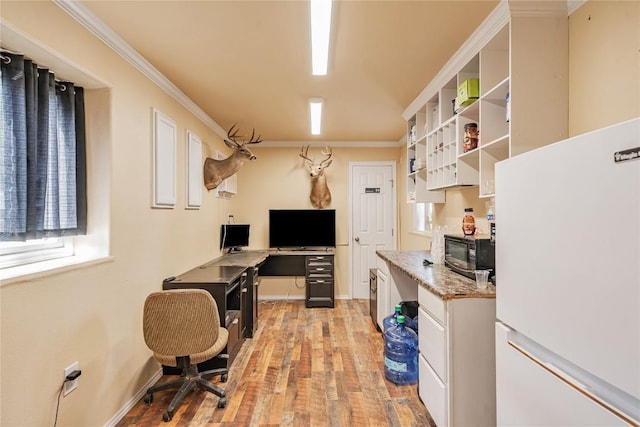 office area featuring ornamental molding and light wood finished floors