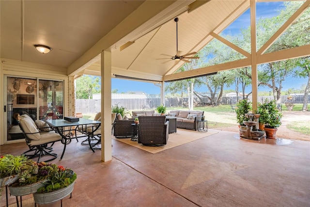 view of patio / terrace with a fenced backyard, a ceiling fan, outdoor dining space, and outdoor lounge area