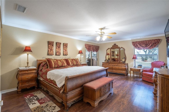 bedroom with ceiling fan, dark wood finished floors, baseboards, visible vents, and ornamental molding