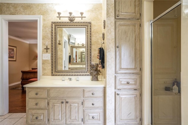 200 County Road 180, Leander, TX 78641 - bathroom with vanity, tile patterned floors, and crown molding