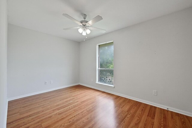 7304 Beckett Rd, Austin, TX 78749 - spare room with ceiling fan and light wood finished floors