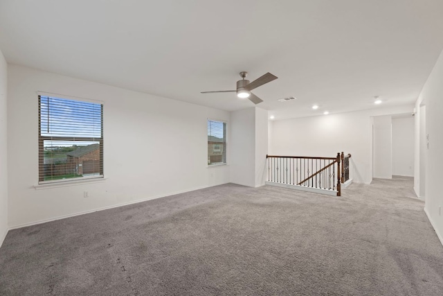 3944 Tufino Ln, Round Rock, TX 78665 - empty room with visible vents, baseboards, a ceiling fan, and carpet floors