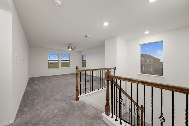 3944 Tufino Ln, Round Rock, TX 78665 - hall with carpet, visible vents, an upstairs landing, and recessed lighting