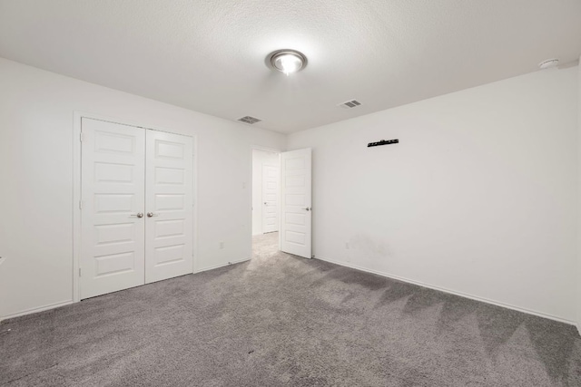 3944 Tufino Ln, Round Rock, TX 78665 - unfurnished bedroom featuring carpet, visible vents, and a closet