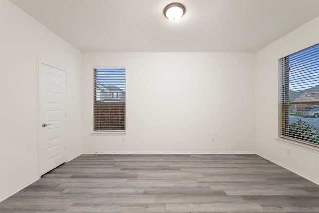 3944 Tufino Ln, Round Rock, TX 78665 - empty room featuring wood finished floors and baseboards