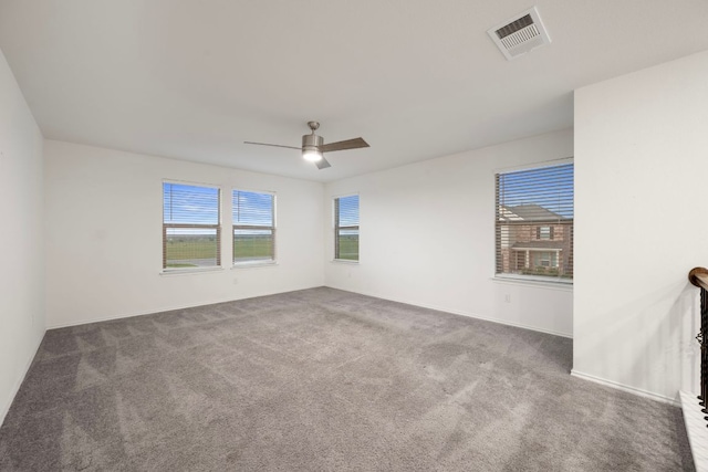 3944 Tufino Ln, Round Rock, TX 78665 - carpeted empty room featuring ceiling fan, baseboards, and visible vents
