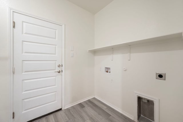 3944 Tufino Ln, Round Rock, TX 78665 - laundry room featuring light wood finished floors, laundry area, gas dryer hookup, hookup for an electric dryer, and hookup for a washing machine