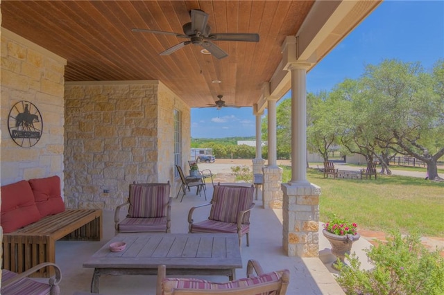 view of patio with covered porch and a ceiling fan