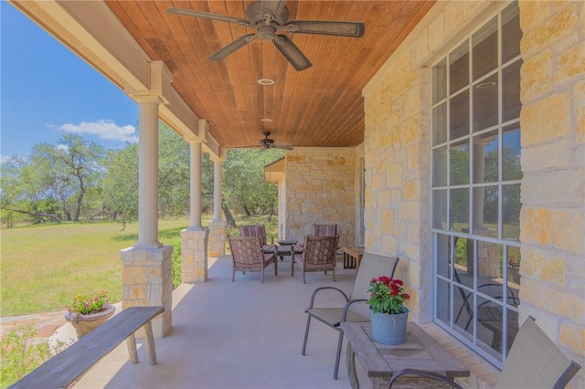 view of patio / terrace with a ceiling fan and covered porch