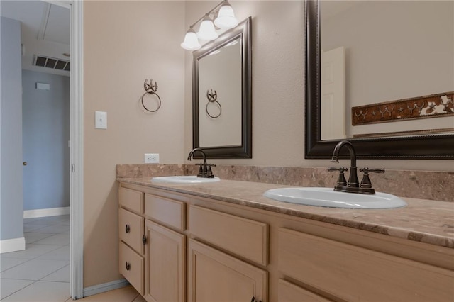 full bathroom featuring tile patterned flooring, a sink, visible vents, and double vanity