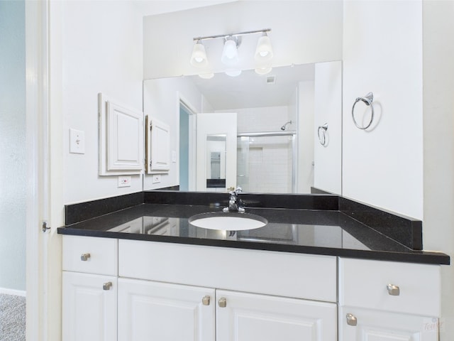 806 W 24th St Unit 312, Austin, TX 78705 - bathroom with a shower stall and vanity