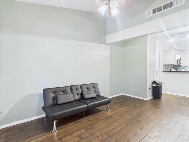 806 W 24th St Unit 312, Austin, TX 78705 - sitting room with wood finished floors, ceiling fan, and baseboards