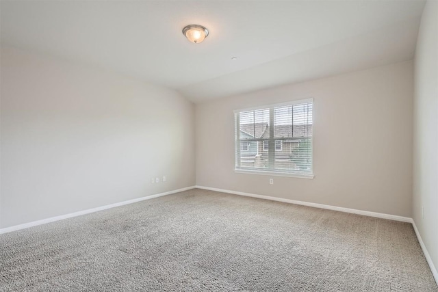 516 E Slaughter Ln Unit 1101, Austin, TX 78744 - unfurnished room with carpet floors, baseboards, and vaulted ceiling