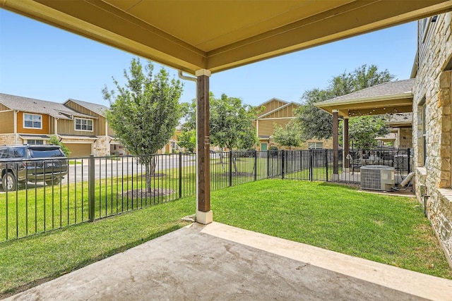 516 E Slaughter Ln Unit 1101, Austin, TX 78744 - view of yard featuring fence, a patio, central AC, and a residential view