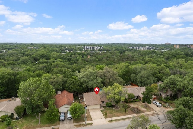 bird's eye view with a forest view