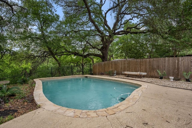 view of pool with a fenced in pool and a fenced backyard